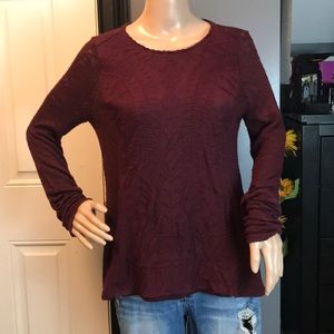 Rewind size medium. Maroon with design long sleeve